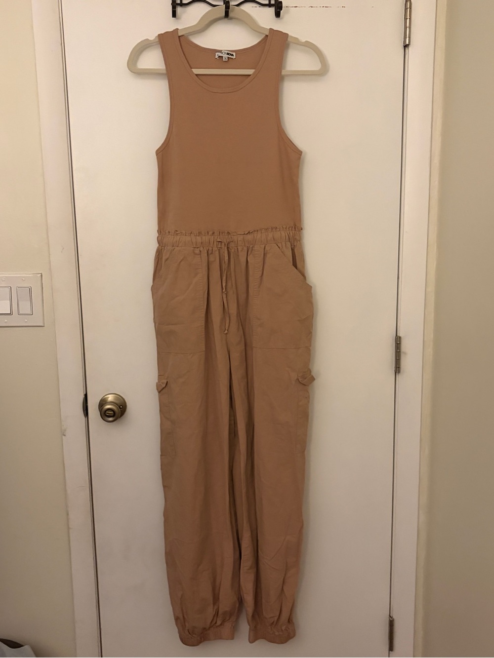 Fashion Nova Sleeveless Drawstring Utility Jumpsuit in Tan